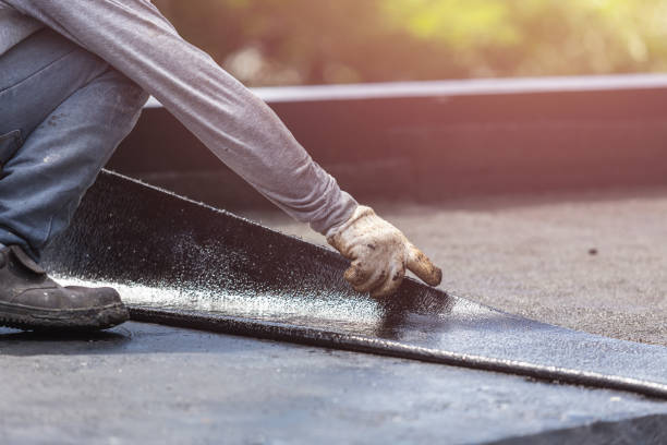 Professional Waterproofing technician working in Brookwood, AL
